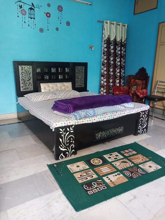 Postel nebo postele na pokoji v ubytování Sunita homestay