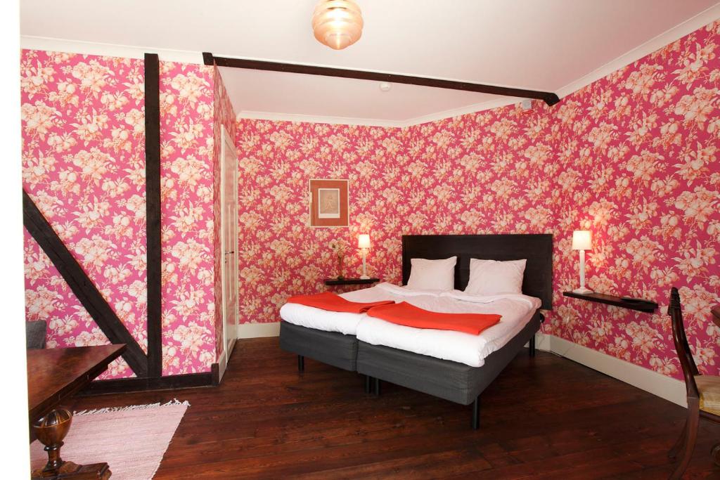 Postel nebo postele na pokoji v ubytování Ardrebo B&B
