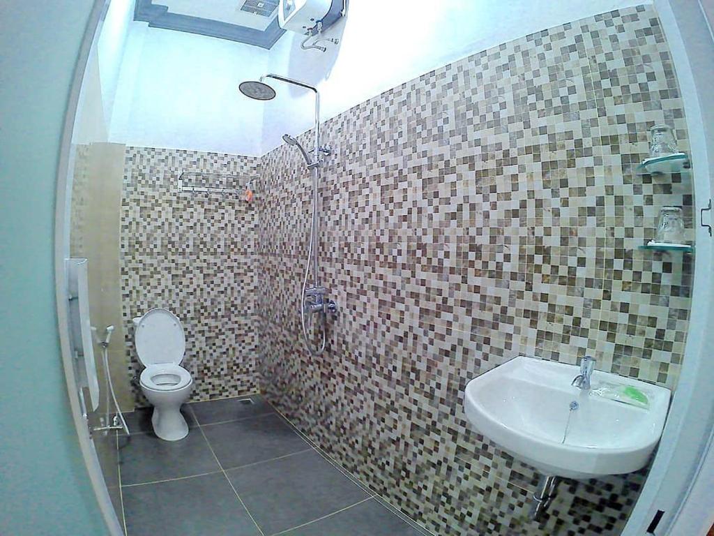 Koupelna v ubytování Amaryllis Guesthouse Syariah