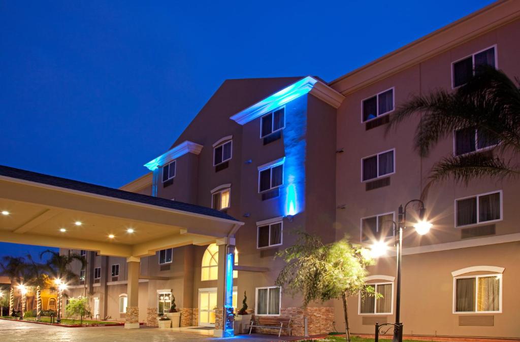 a rendering of a hotel at night at Holiday Inn Express Hotel & Suites Los Angeles Airport Hawthorne, an IHG Hotel in Hawthorne