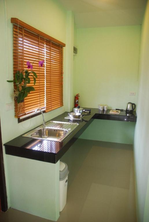 Kuchyň nebo kuchyňský kout v ubytování Anacar Bungalows