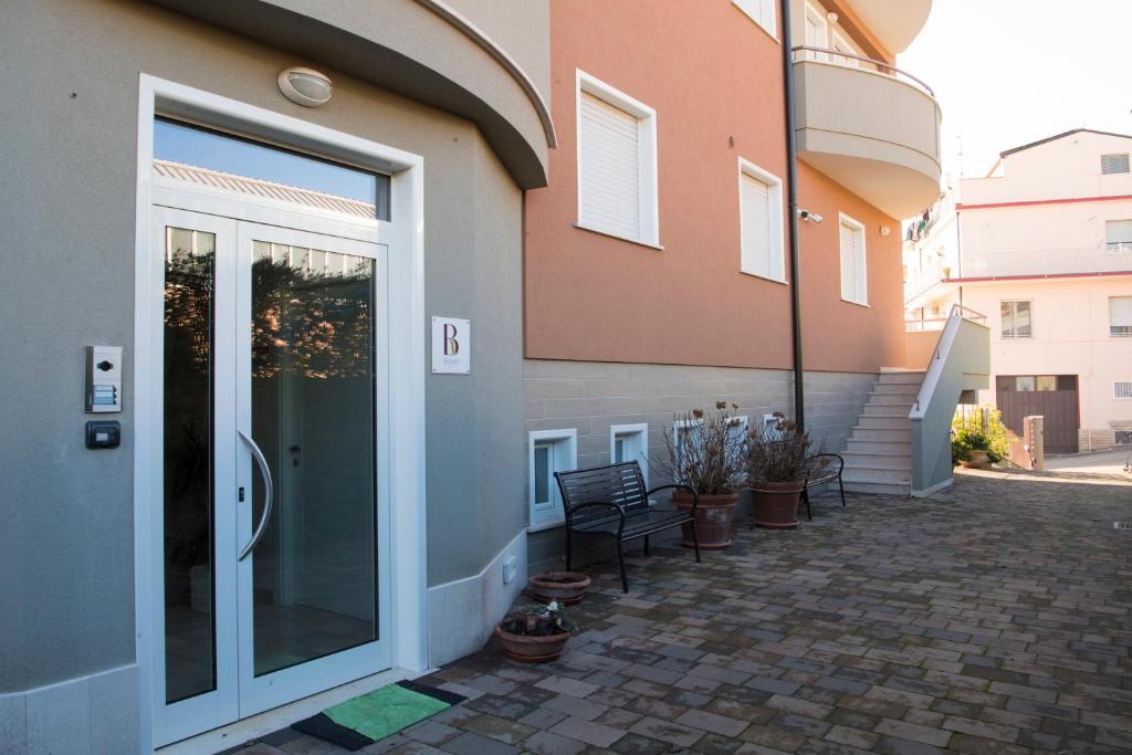 a door to a house with a patio at Residence Bonelli in Grassano