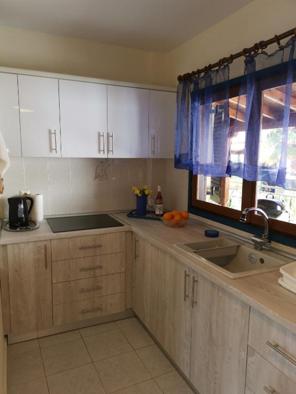 Kuchyňa alebo kuchynka v ubytovaní Orange_Blue_Aparment №1