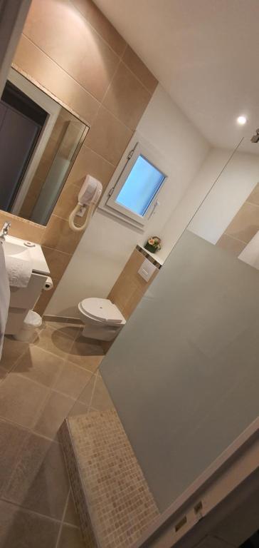 Koupelna v ubytování Hotel Cote d'Argent
