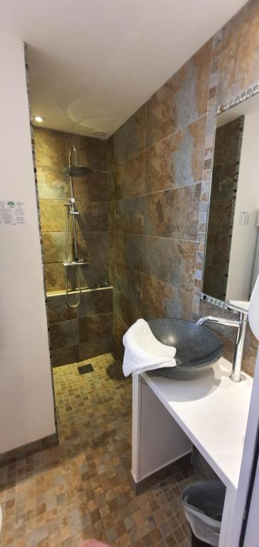 Koupelna v ubytování Hotel Cote d'Argent