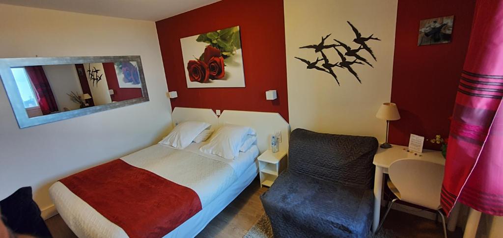 Postel nebo postele na pokoji v ubytování Hotel Cote d'Argent