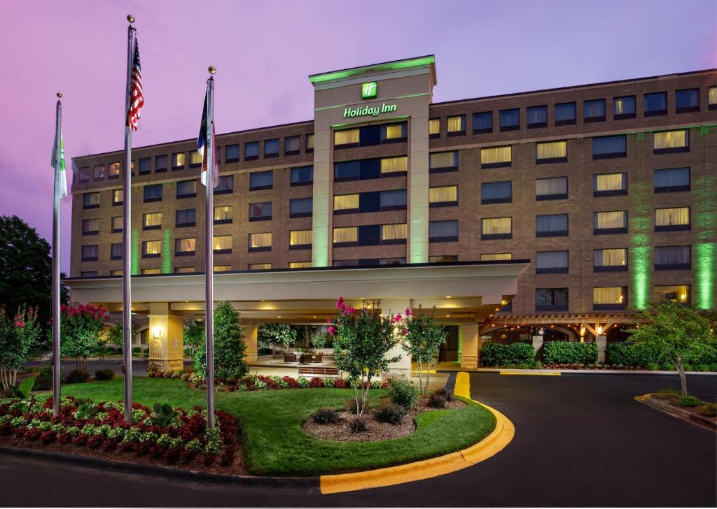 a rendering of the front of a hotel at Holiday Inn Charlotte University, an IHG Hotel in Charlotte