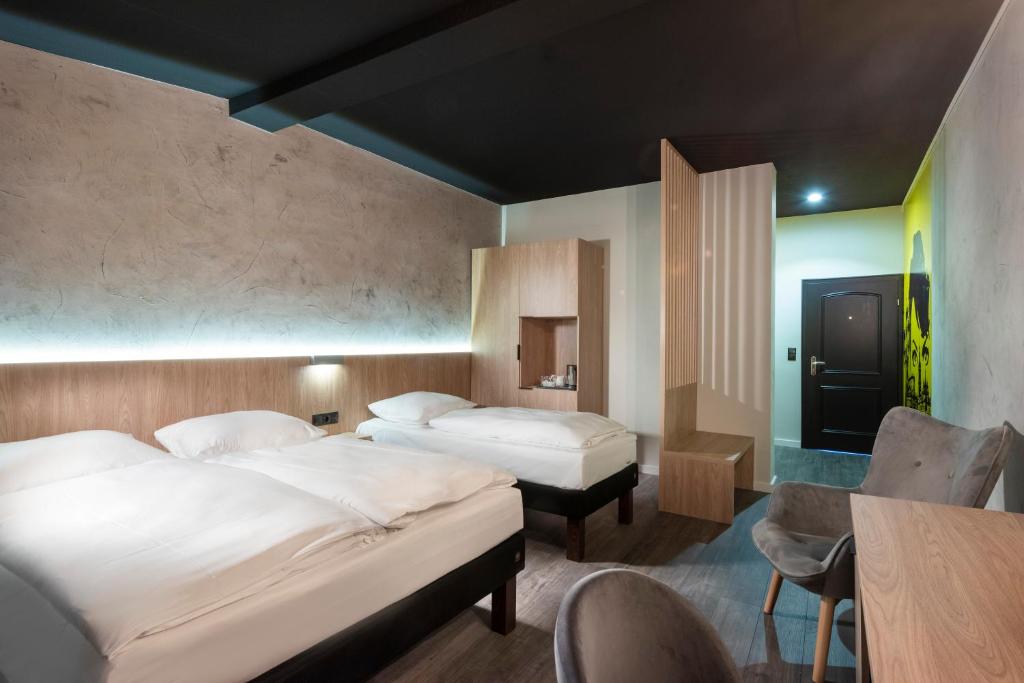 
Triple Room (Double Bed + Single Bed)
