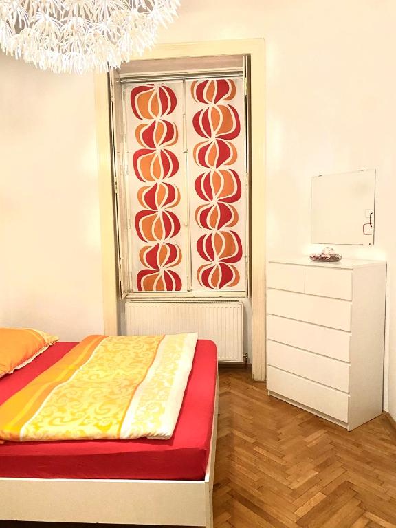 Postel nebo postele na pokoji v ubytování Apartment opera 1
