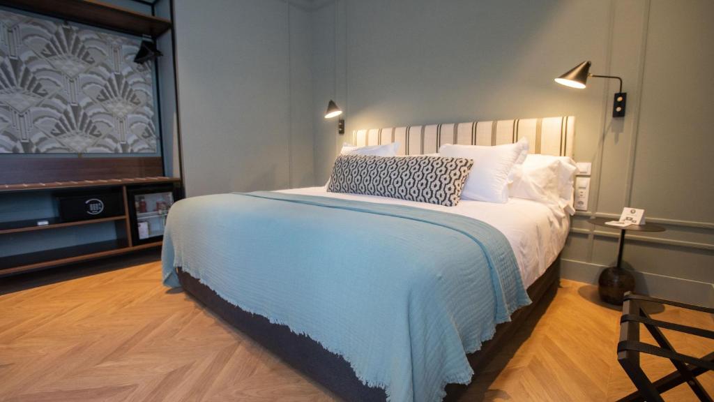 Posteľ alebo postele v izbe v ubytovaní Soho Boutique Colón