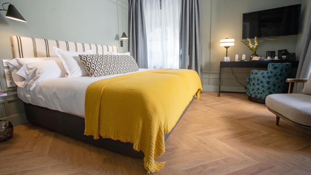 Posteľ alebo postele v izbe v ubytovaní Soho Boutique Colón