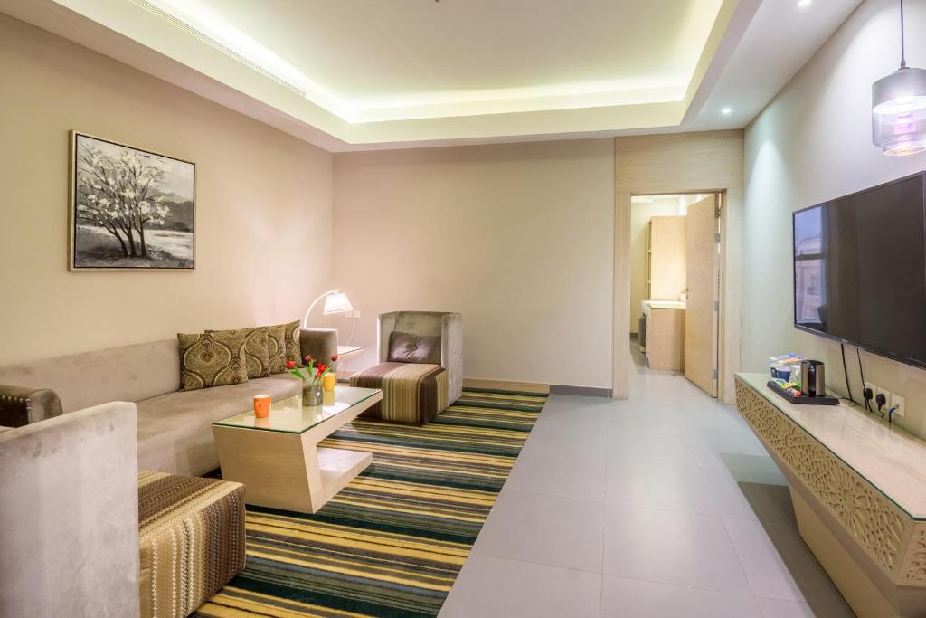 TV a/nebo společenská místnost v ubytování Ewaa Express Hotel - Al Hamra