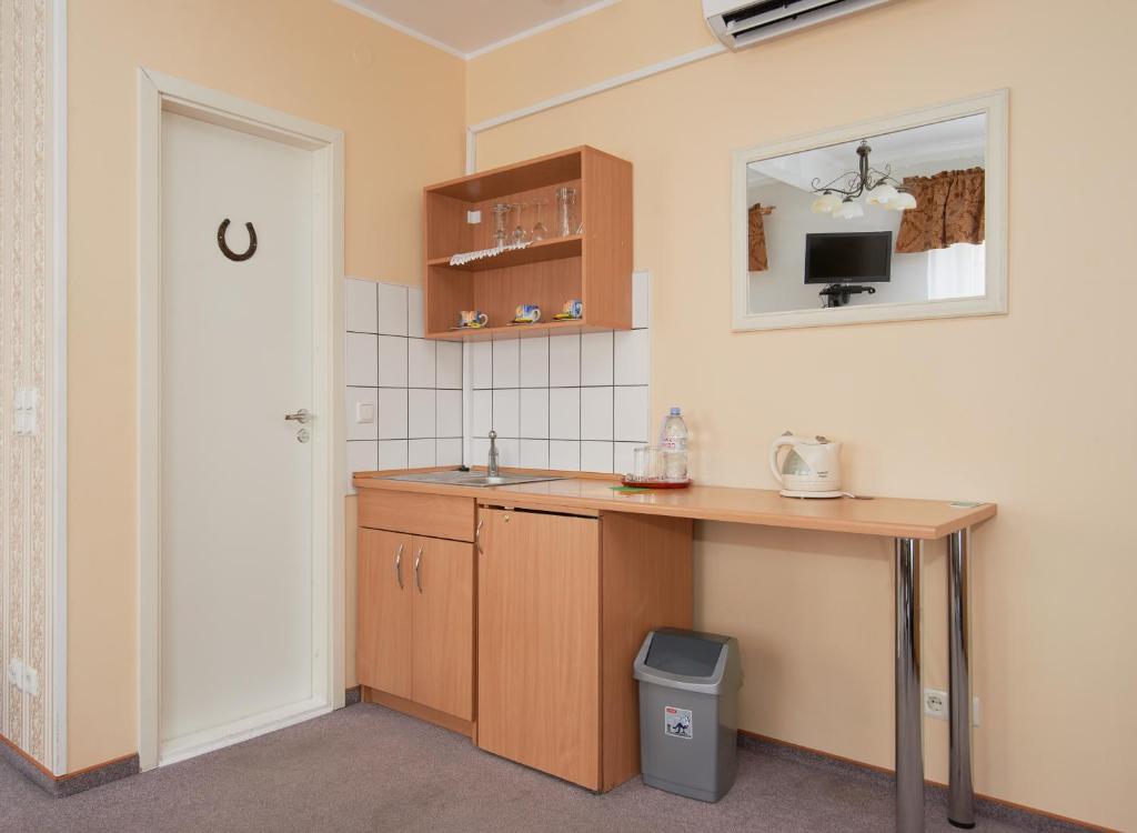 Kuchyň nebo kuchyňský kout v ubytování Angel Town Hall Apartments