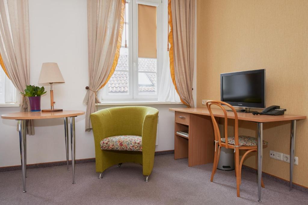 TV a/nebo společenská místnost v ubytování Angel Town Hall Apartments