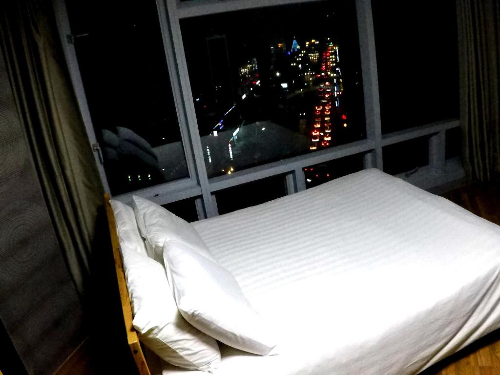 Postel nebo postele na pokoji v ubytování Busan Popcorn Hostel
