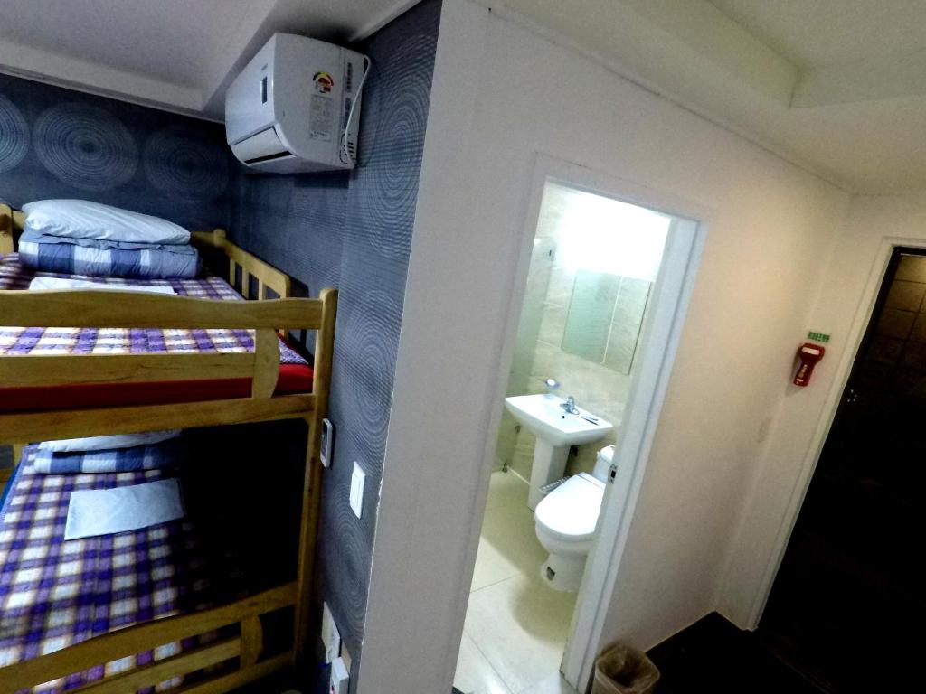 Postel nebo postele na pokoji v ubytování Busan Popcorn Hostel