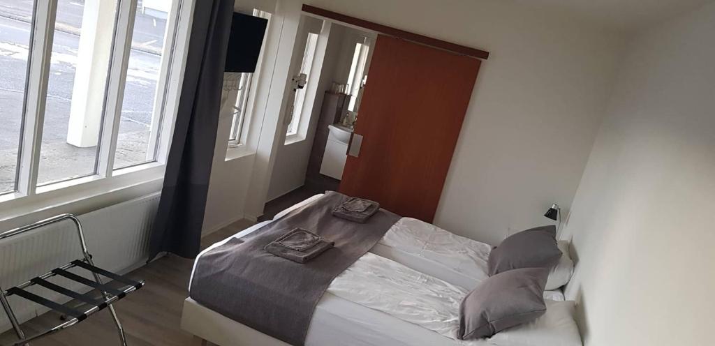 Postel nebo postele na pokoji v ubytování Apotek Guesthouse