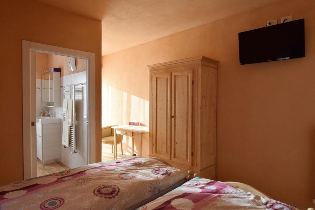 Postel nebo postele na pokoji v ubytování B&B SEGONZANO
