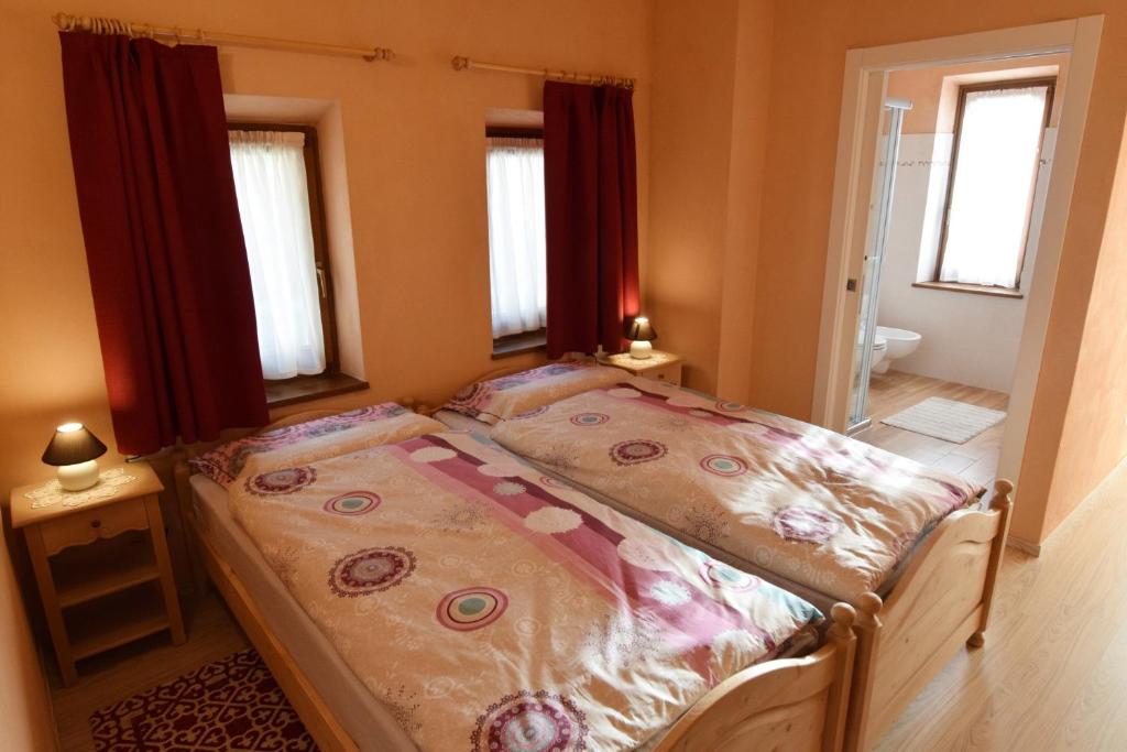 Postel nebo postele na pokoji v ubytování B&B SEGONZANO