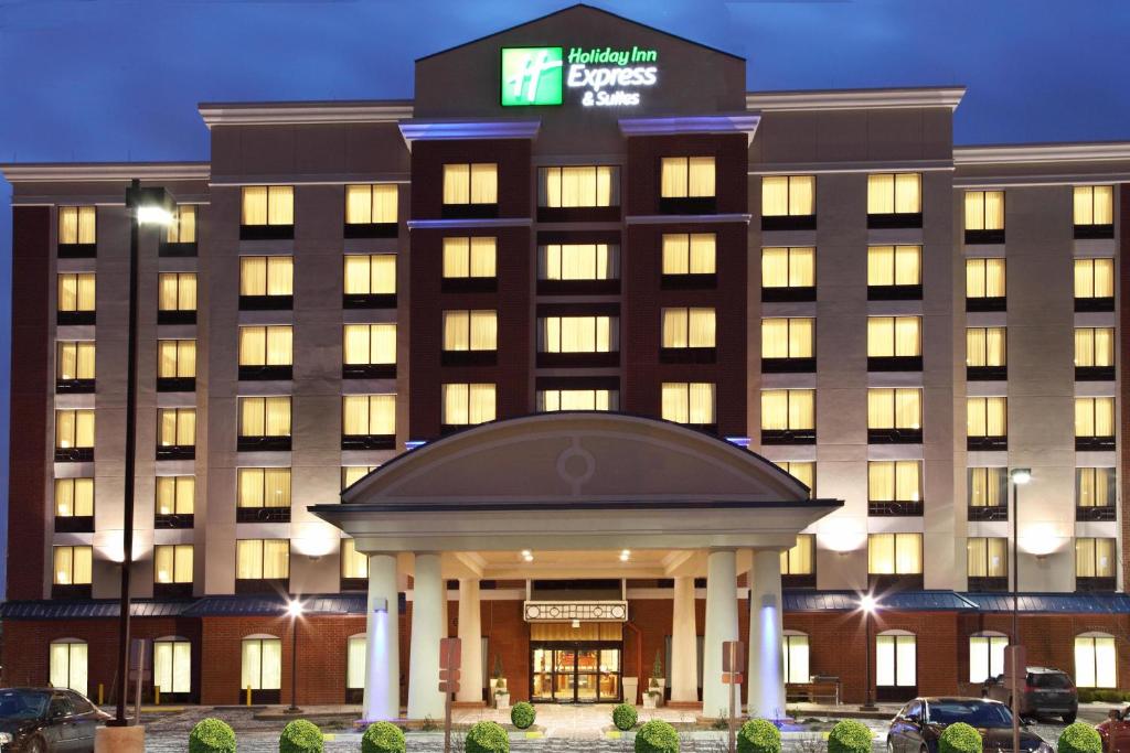 a hotel front of a building with a sign on it at Holiday Inn Express Hotel & Suites Ohio State University- OSU Medical Center, an IHG Hotel in Columbus
