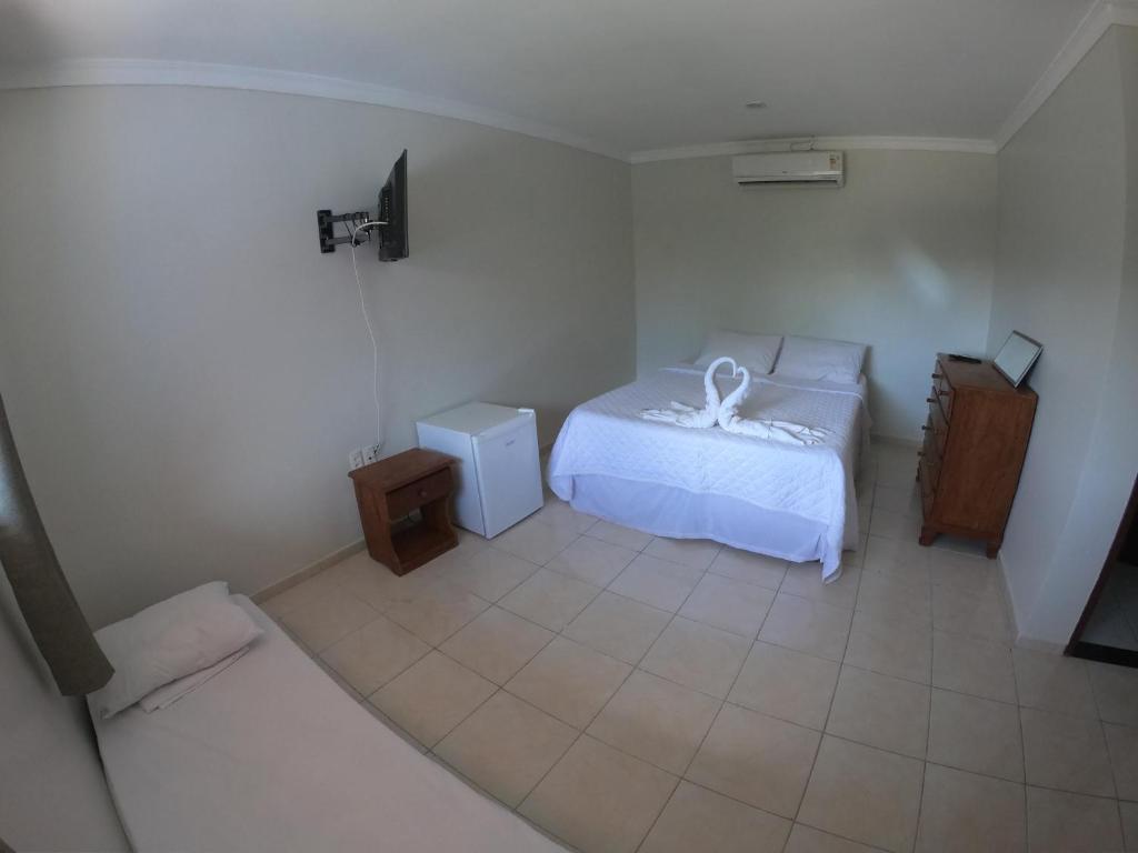 Postel nebo postele na pokoji v ubytování Pousada Casa Nui - Porto de Galinhas by Concavus
