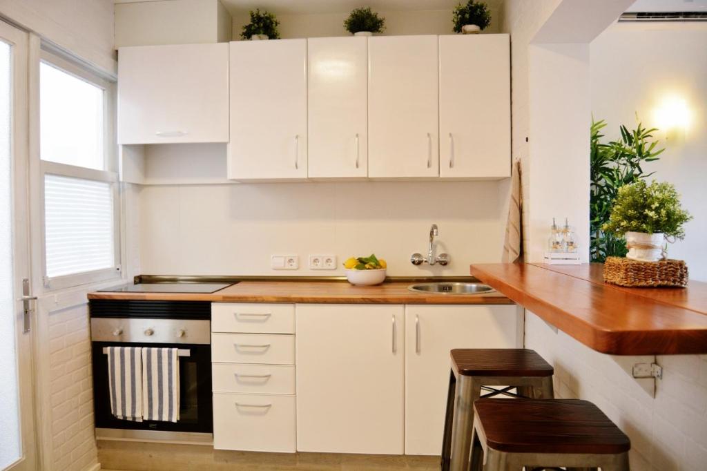 Kuchyň nebo kuchyňský kout v ubytování Sea House Can Picafort