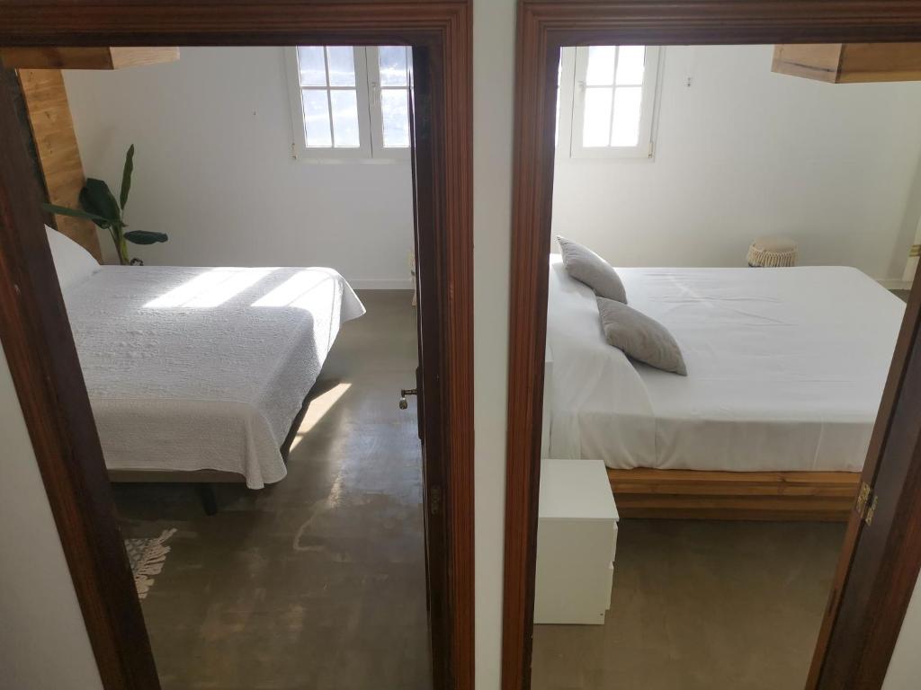 Postel nebo postele na pokoji v ubytování VISTAMAR