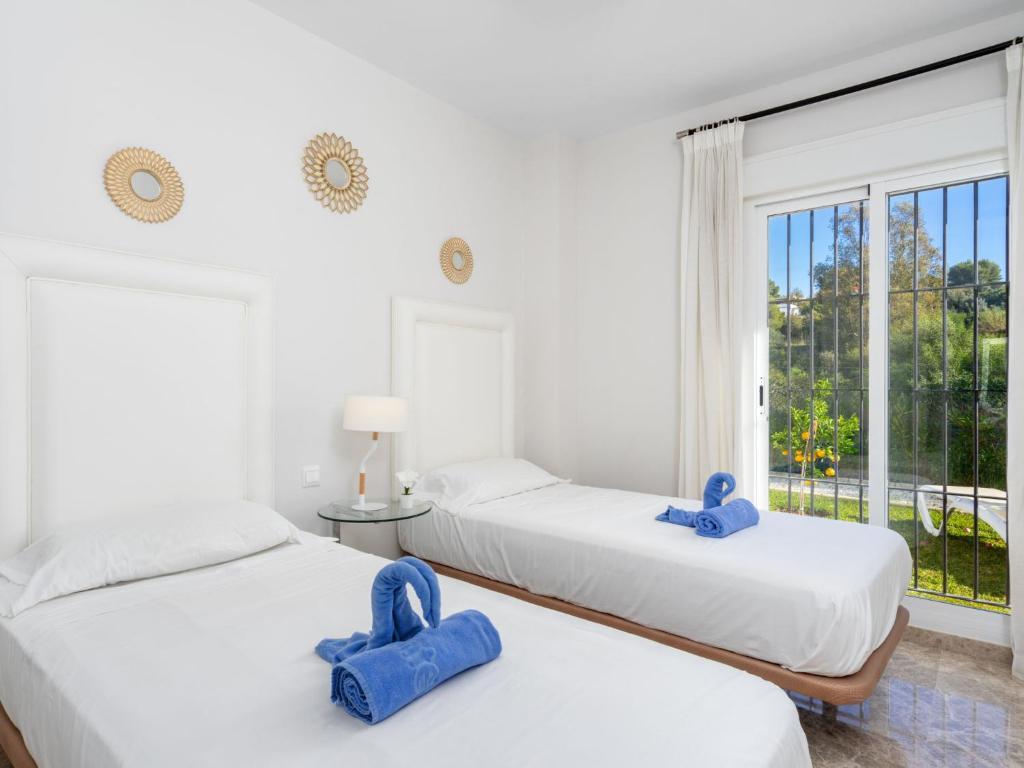 Posteľ alebo postele v izbe v ubytovaní Holiday Home Los Naranjos Singles by Interhome