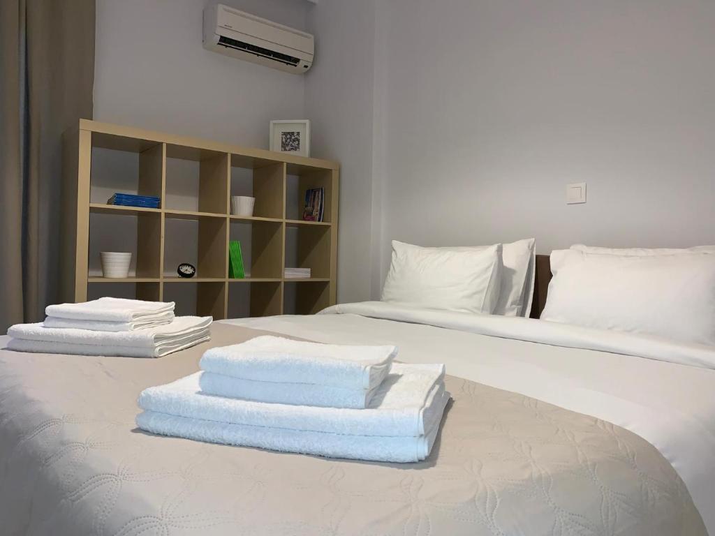 A bed or beds in a room at Treasure cosy flat