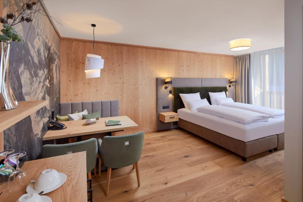 Postel nebo postele na pokoji v ubytování Zugspitz Resort