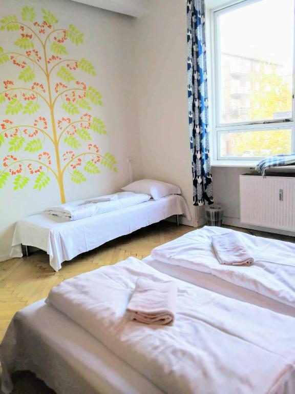 A bed or beds in a room at Sleep in Heaven