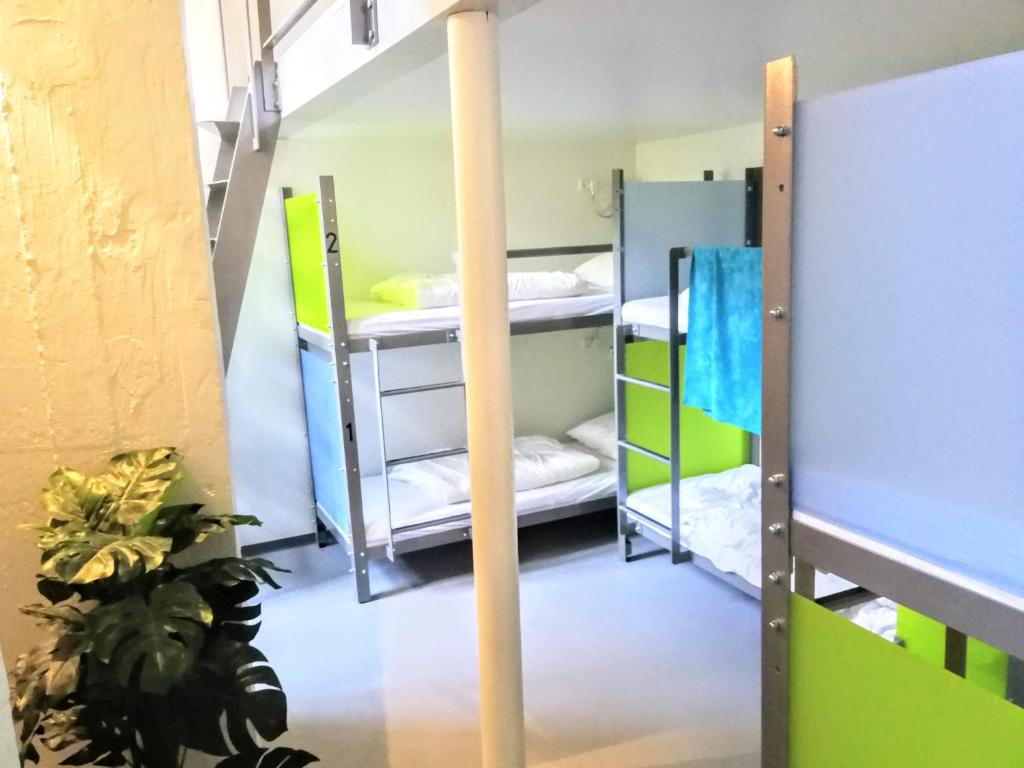 A bed or beds in a room at Sleep in Heaven