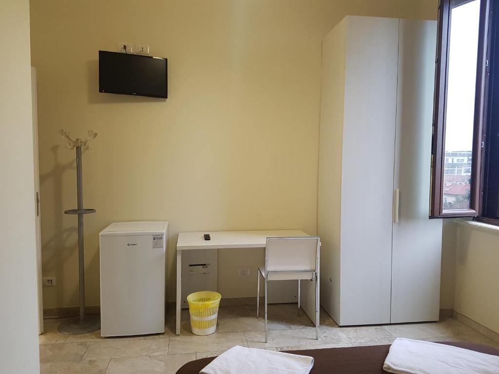 Telewizja i/lub zestaw kina domowego w obiekcie Hotel Emmy