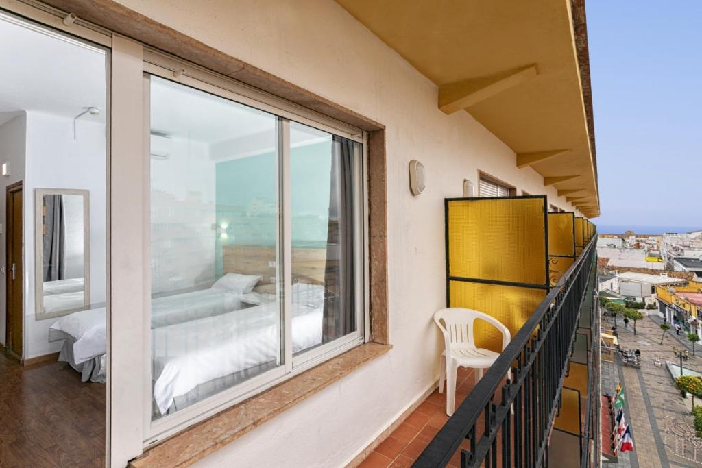 Posteľ alebo postele v izbe v ubytovaní Hotel Torremolinos Centro by Croma