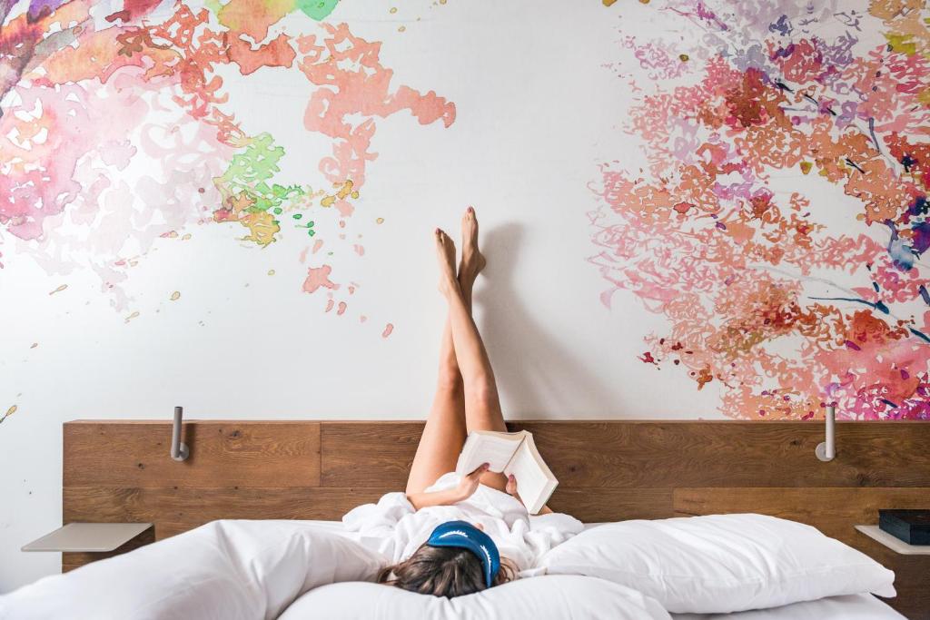 Postel nebo postele na pokoji v ubytování QC Room San Pellegrino