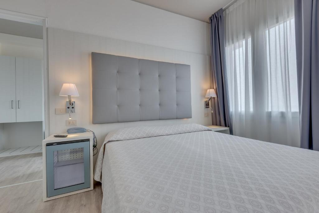 Postel nebo postele na pokoji v ubytování Hotel Austria