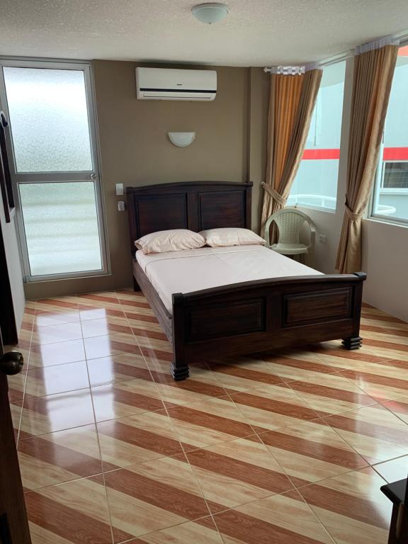 Postel nebo postele na pokoji v ubytování Hotel Kemarios