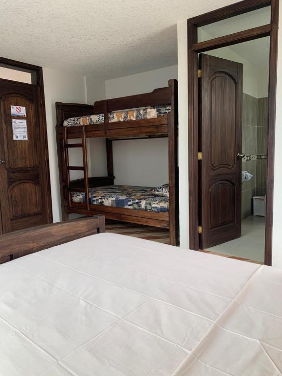 Postel nebo postele na pokoji v ubytování Hotel Kemarios