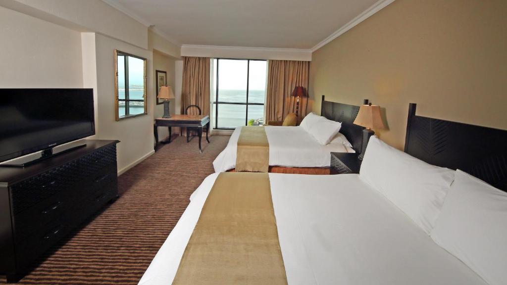 Postel nebo postele na pokoji v ubytování Intercontinental Miramar Panama by IHG