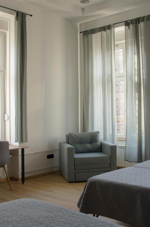 Postel nebo postele na pokoji v ubytování K43 Rooms