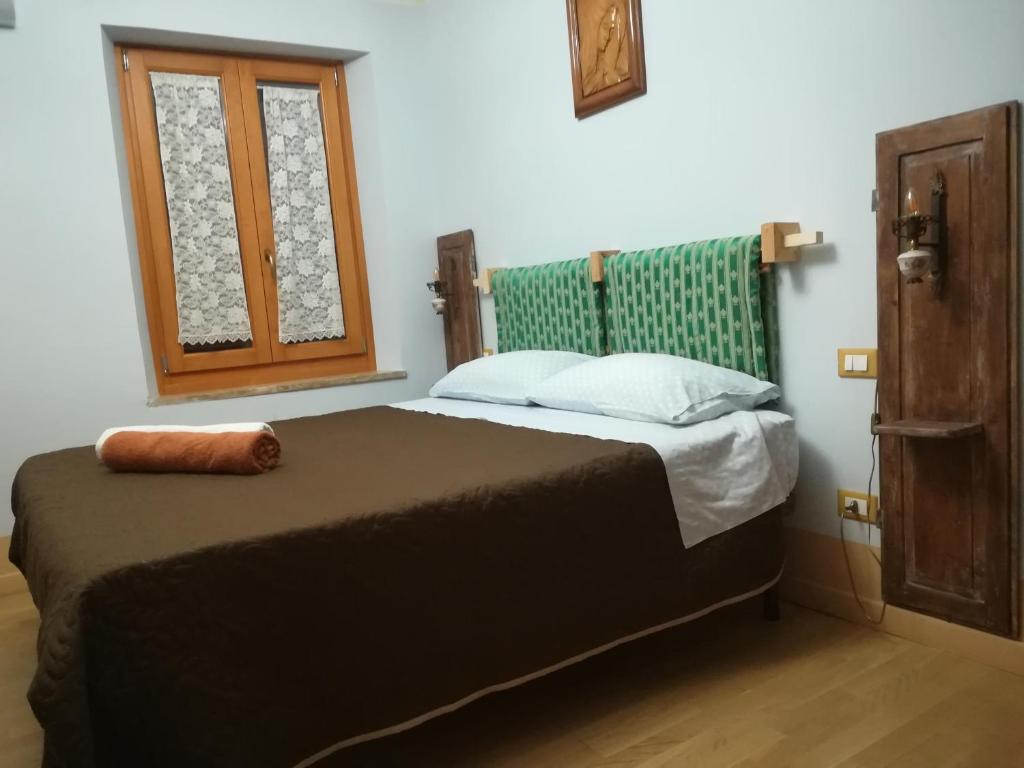 Postel nebo postele na pokoji v ubytování Pantorano rooms