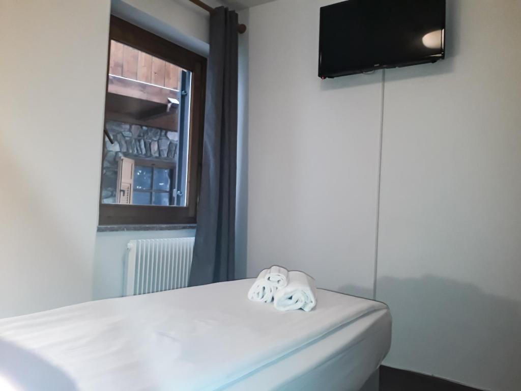 TV a/nebo společenská místnost v ubytování Sas da Rocia by go new location