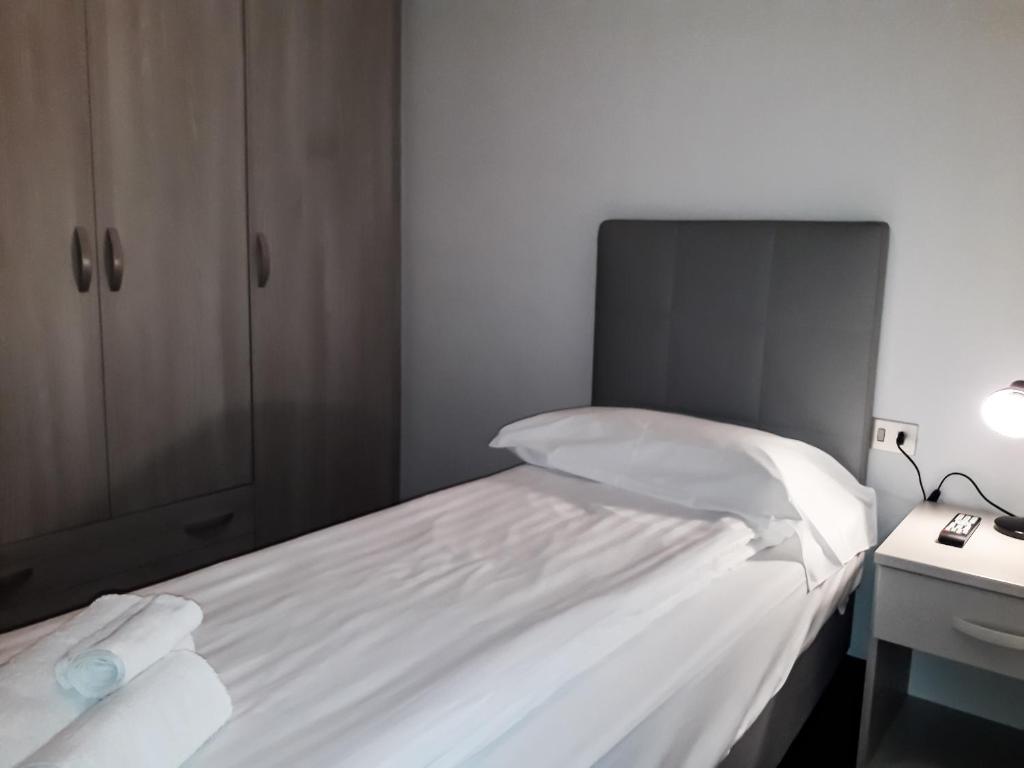 Postel nebo postele na pokoji v ubytování Sas da Rocia by go new location