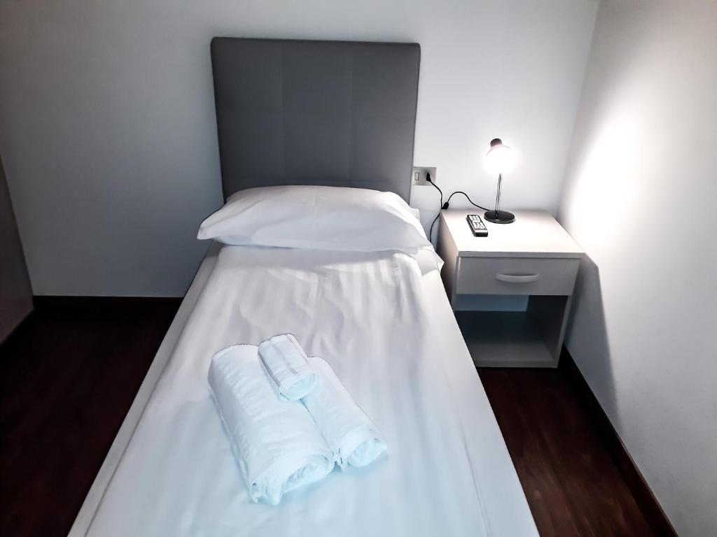 Postel nebo postele na pokoji v ubytování Sas da Rocia by go new location