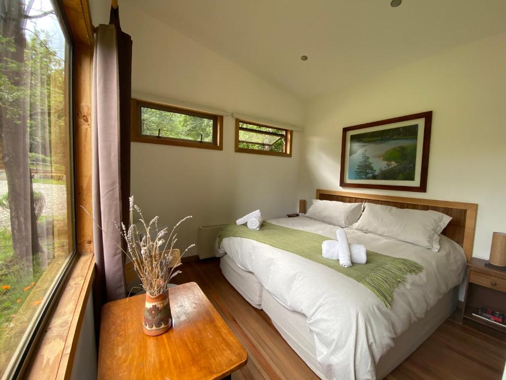 Postel nebo postele na pokoji v ubytování Hotel Patagonia House
