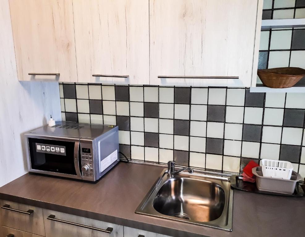 Kuchyň nebo kuchyňský kout v ubytování Sas da Rocia by go new location