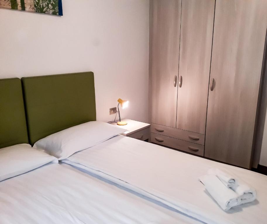 Postel nebo postele na pokoji v ubytování Sas da Rocia by go new location