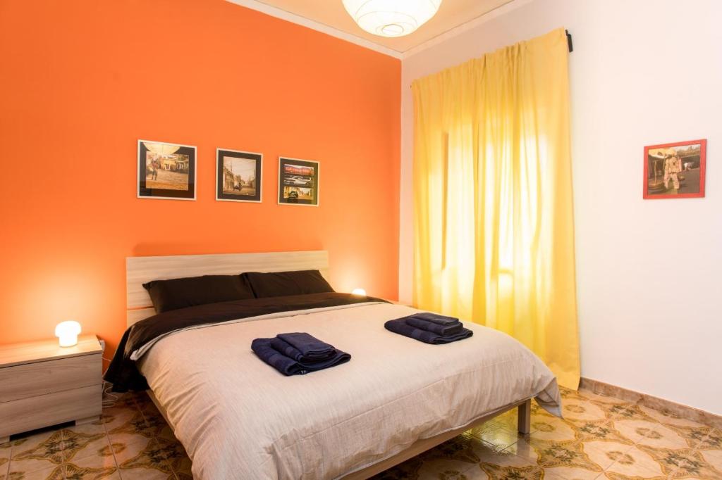 Кровать или кровати в номере Neapolis Bay