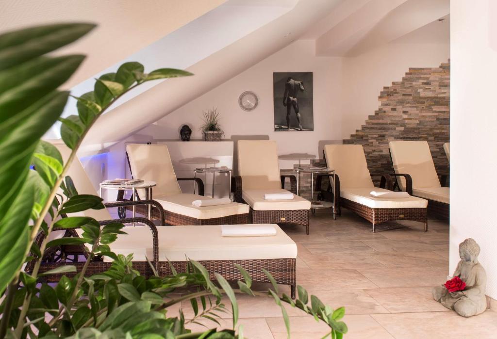 Posezení v ubytování Radisson Blu Hotel Halle-Merseburg