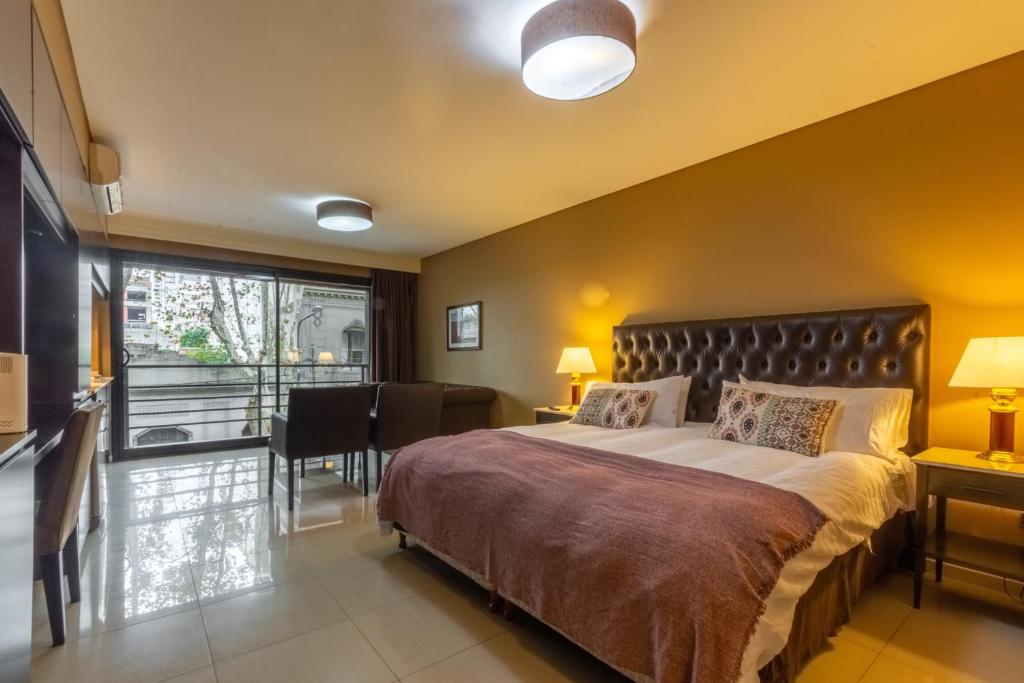 En eller flere senge i et værelse på Silky Studio in Palermo Hollywood